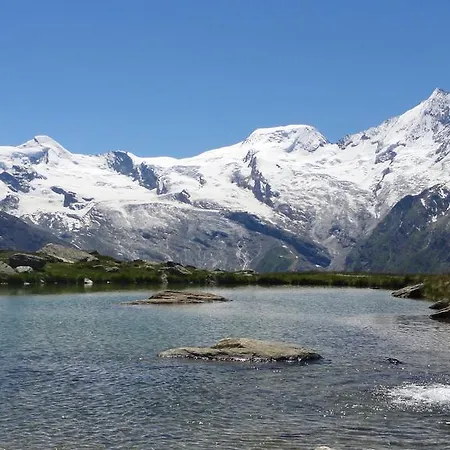 Апартаменты Haus Alpenglueck Зас-Фе